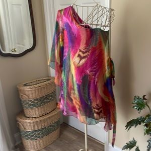 Contemporary , off one shoulder dress with beautiful  colored fabric design.